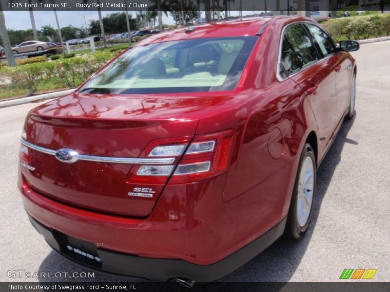 Ruby Red Metallic / Dune 2015 Ford Taurus SEL