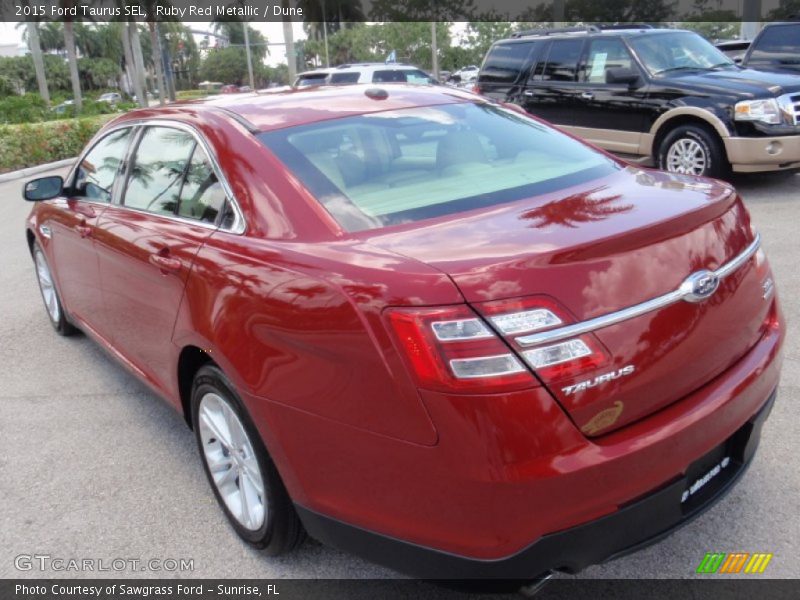 Ruby Red Metallic / Dune 2015 Ford Taurus SEL