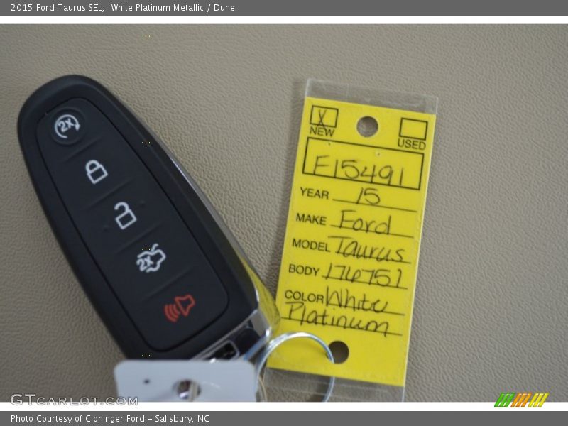 White Platinum Metallic / Dune 2015 Ford Taurus SEL