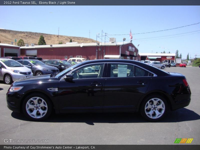 Ebony Black / Light Stone 2012 Ford Taurus SEL