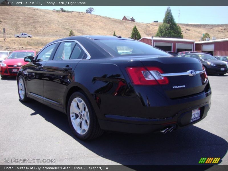 Ebony Black / Light Stone 2012 Ford Taurus SEL