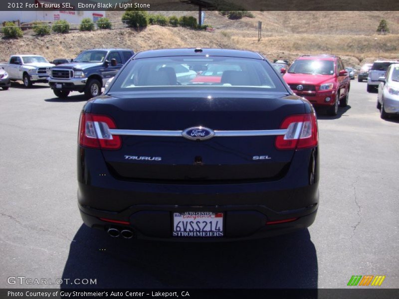 Ebony Black / Light Stone 2012 Ford Taurus SEL