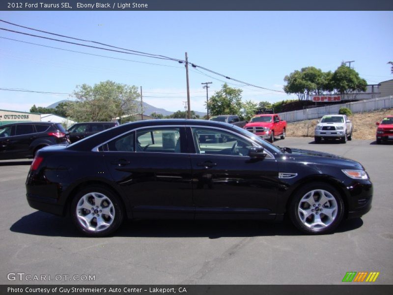Ebony Black / Light Stone 2012 Ford Taurus SEL
