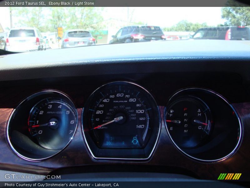 Ebony Black / Light Stone 2012 Ford Taurus SEL