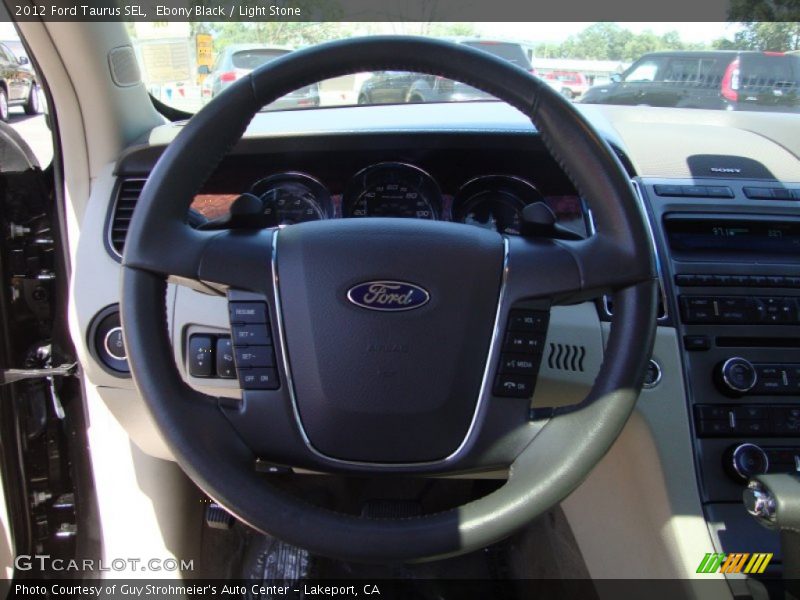 Ebony Black / Light Stone 2012 Ford Taurus SEL