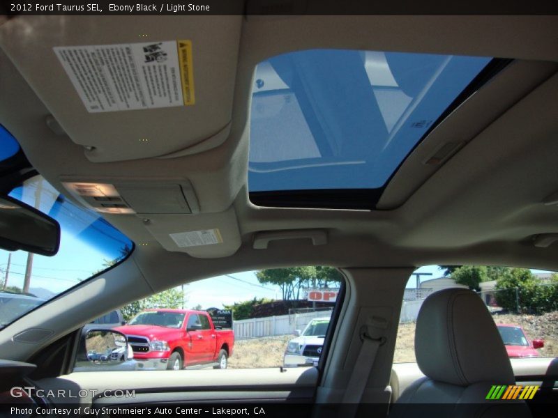 Ebony Black / Light Stone 2012 Ford Taurus SEL