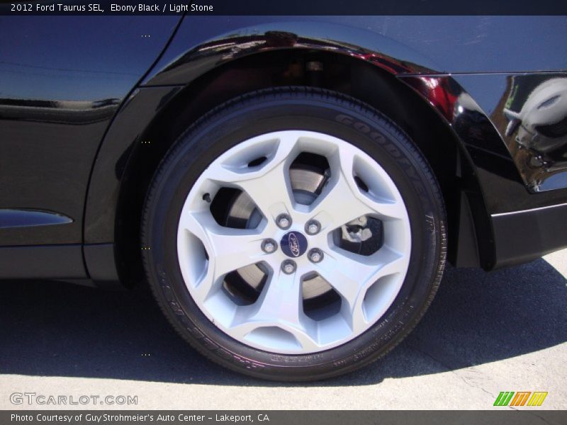 Ebony Black / Light Stone 2012 Ford Taurus SEL