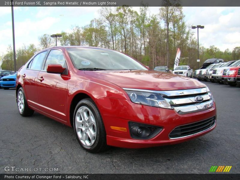 Sangria Red Metallic / Medium Light Stone 2010 Ford Fusion SE