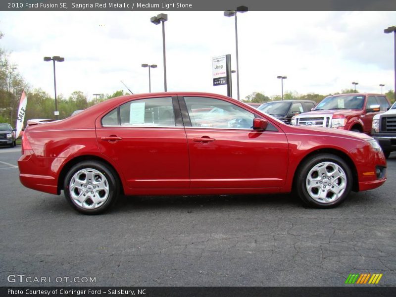 Sangria Red Metallic / Medium Light Stone 2010 Ford Fusion SE