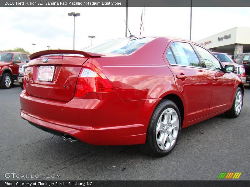 Sangria Red Metallic / Medium Light Stone 2010 Ford Fusion SE