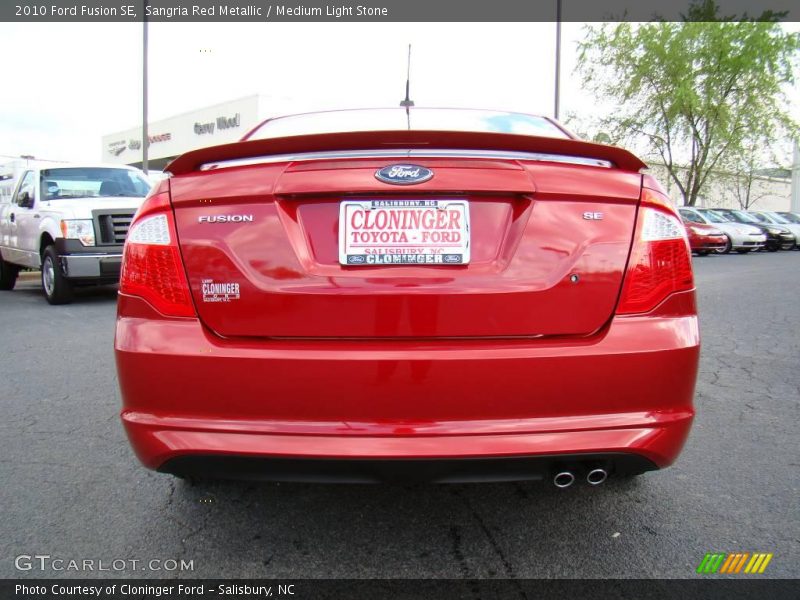 Sangria Red Metallic / Medium Light Stone 2010 Ford Fusion SE
