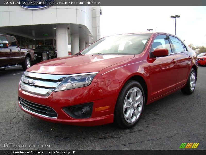 Sangria Red Metallic / Medium Light Stone 2010 Ford Fusion SE