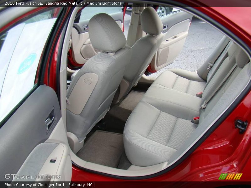 Sangria Red Metallic / Medium Light Stone 2010 Ford Fusion SE