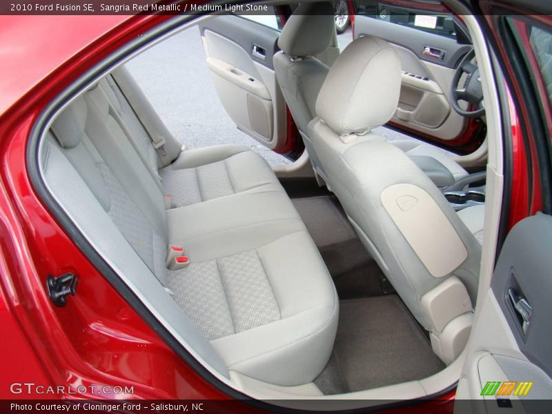 Sangria Red Metallic / Medium Light Stone 2010 Ford Fusion SE