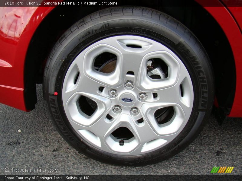 Sangria Red Metallic / Medium Light Stone 2010 Ford Fusion SE