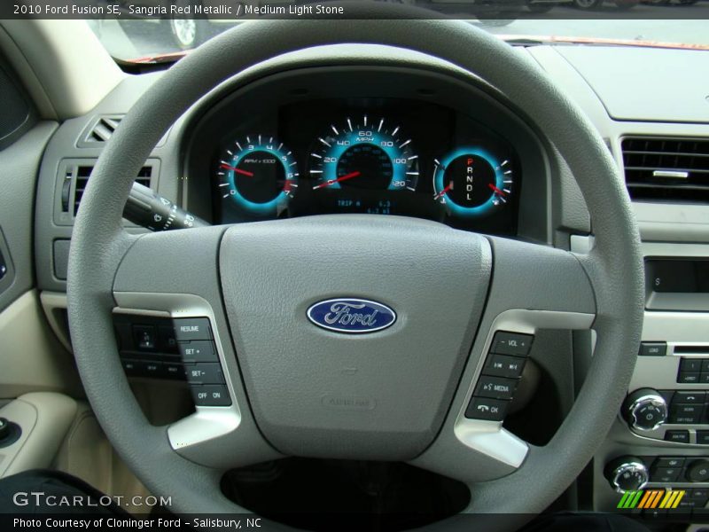 Sangria Red Metallic / Medium Light Stone 2010 Ford Fusion SE