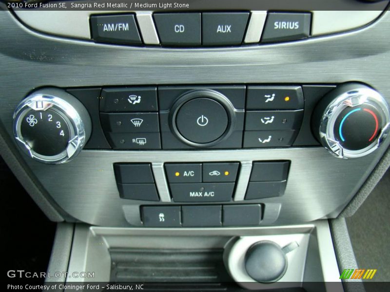Sangria Red Metallic / Medium Light Stone 2010 Ford Fusion SE