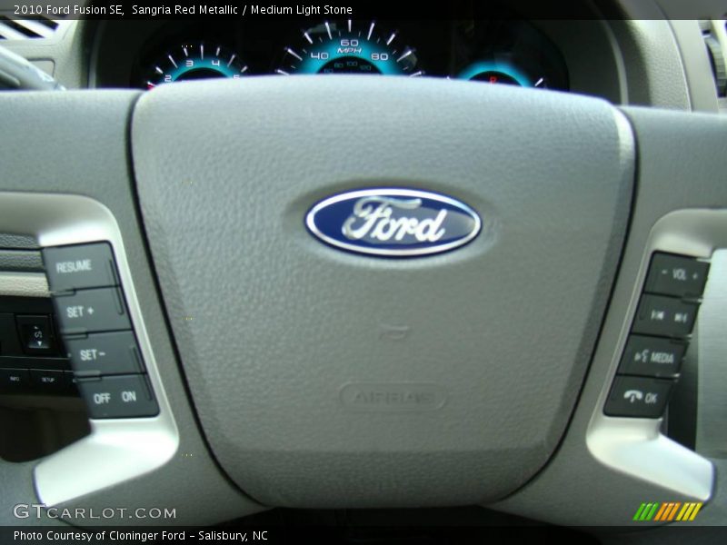 Sangria Red Metallic / Medium Light Stone 2010 Ford Fusion SE