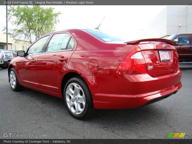 Sangria Red Metallic / Medium Light Stone 2010 Ford Fusion SE