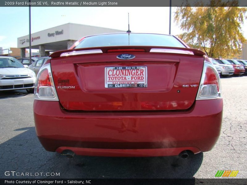 Redfire Metallic / Medium Light Stone 2009 Ford Fusion SE V6