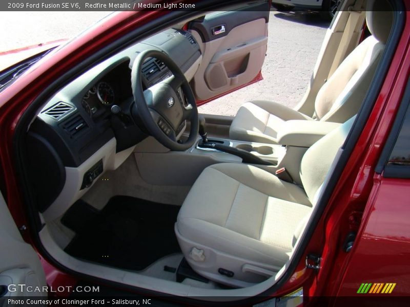 Redfire Metallic / Medium Light Stone 2009 Ford Fusion SE V6