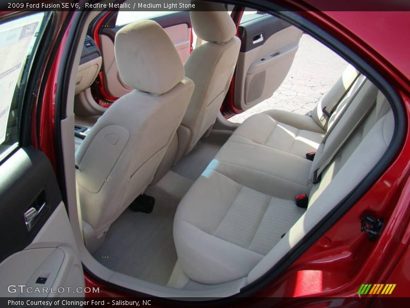 Redfire Metallic / Medium Light Stone 2009 Ford Fusion SE V6