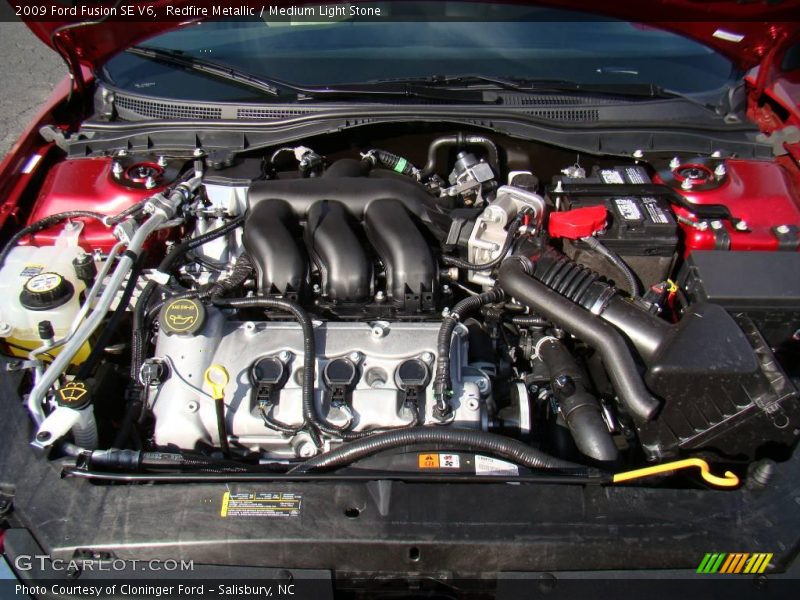 Redfire Metallic / Medium Light Stone 2009 Ford Fusion SE V6
