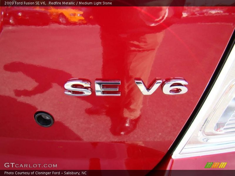 Redfire Metallic / Medium Light Stone 2009 Ford Fusion SE V6