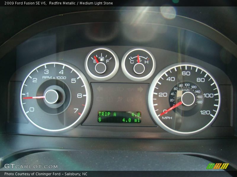 Redfire Metallic / Medium Light Stone 2009 Ford Fusion SE V6