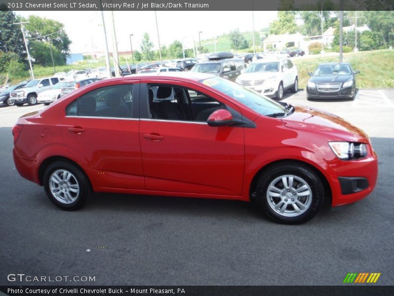 Victory Red / Jet Black/Dark Titanium 2013 Chevrolet Sonic LT Sedan