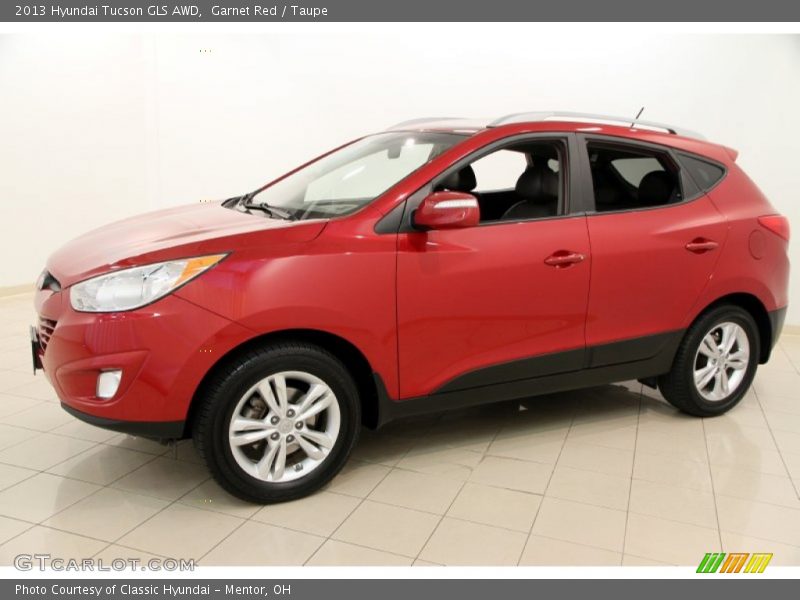 Garnet Red / Taupe 2013 Hyundai Tucson GLS AWD