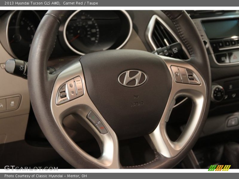Garnet Red / Taupe 2013 Hyundai Tucson GLS AWD