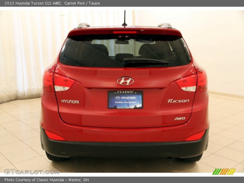Garnet Red / Taupe 2013 Hyundai Tucson GLS AWD