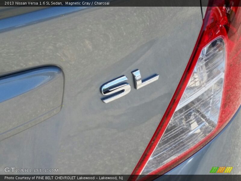 Magnetic Gray / Charcoal 2013 Nissan Versa 1.6 SL Sedan