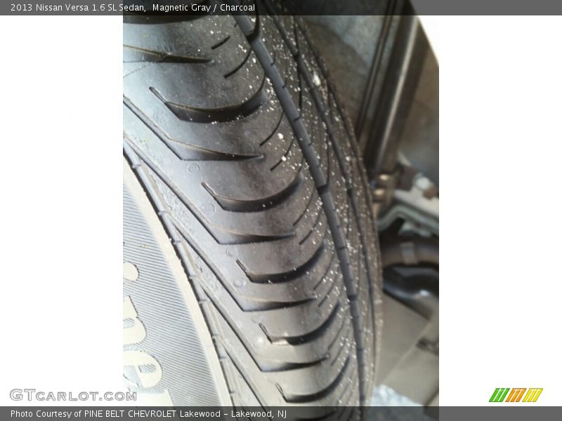 Magnetic Gray / Charcoal 2013 Nissan Versa 1.6 SL Sedan