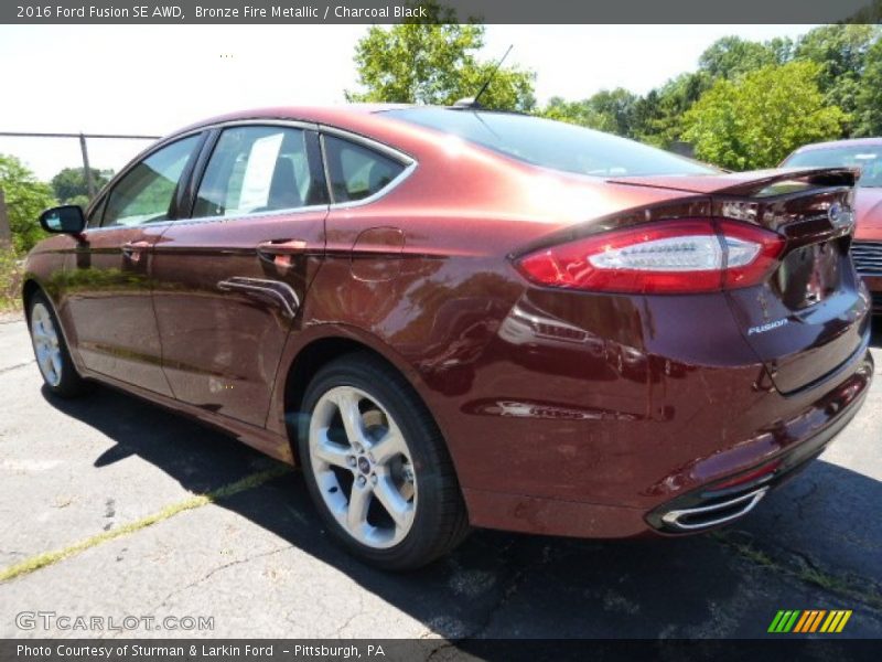 Bronze Fire Metallic / Charcoal Black 2016 Ford Fusion SE AWD