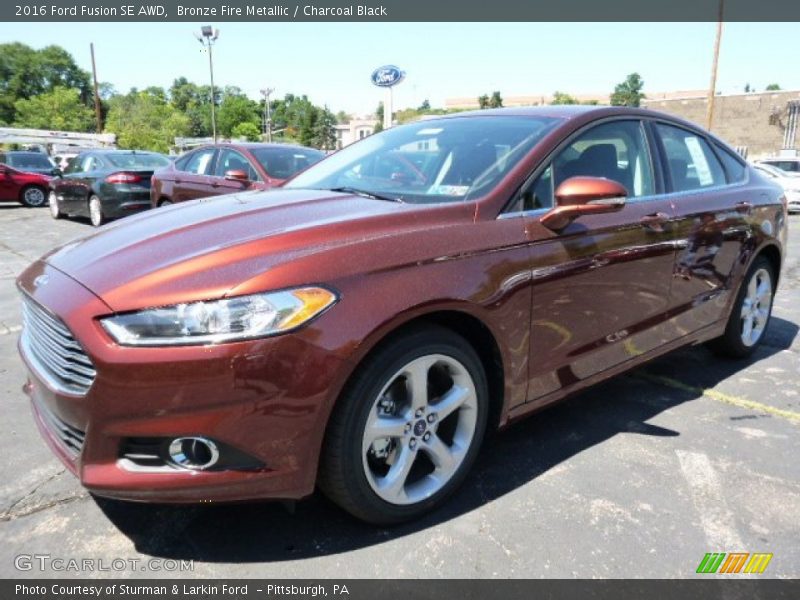 Bronze Fire Metallic / Charcoal Black 2016 Ford Fusion SE AWD