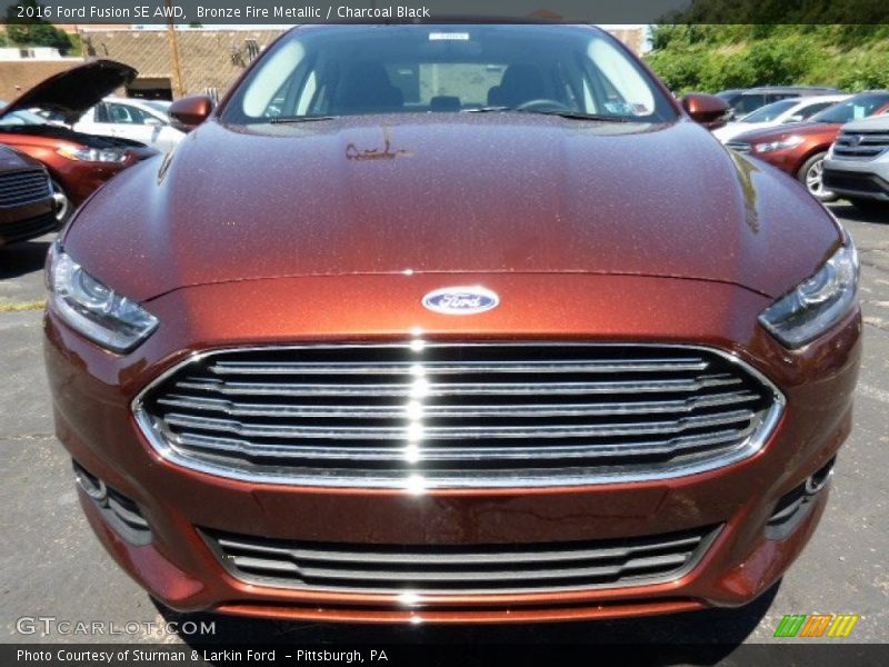 Bronze Fire Metallic / Charcoal Black 2016 Ford Fusion SE AWD