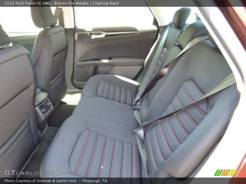 Bronze Fire Metallic / Charcoal Black 2016 Ford Fusion SE AWD