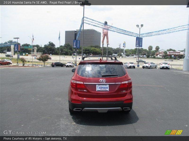Regal Red Pearl / Beige 2016 Hyundai Santa Fe SE AWD