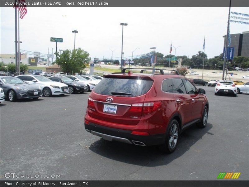 Regal Red Pearl / Beige 2016 Hyundai Santa Fe SE AWD