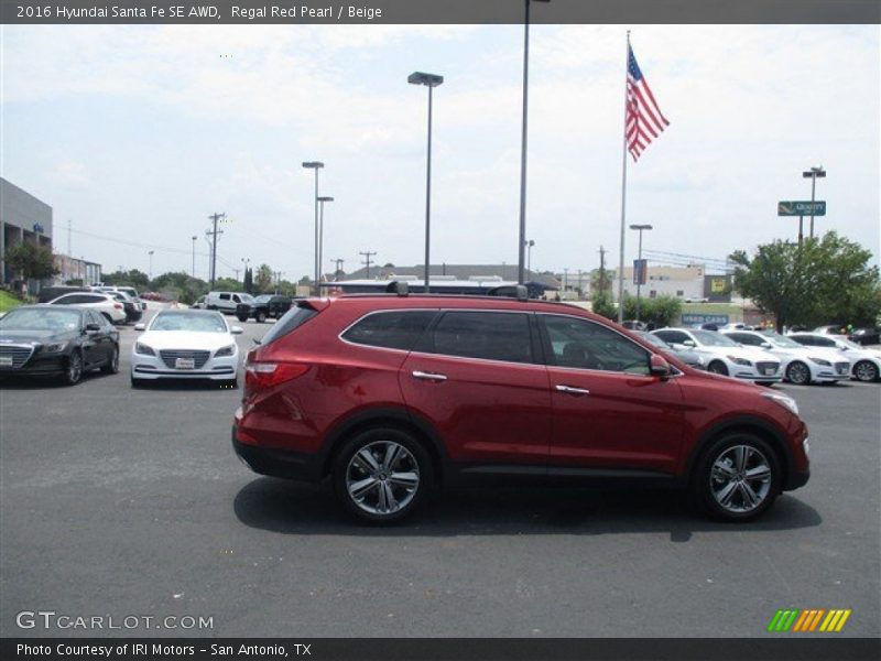 Regal Red Pearl / Beige 2016 Hyundai Santa Fe SE AWD