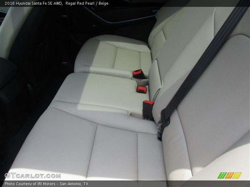 Regal Red Pearl / Beige 2016 Hyundai Santa Fe SE AWD