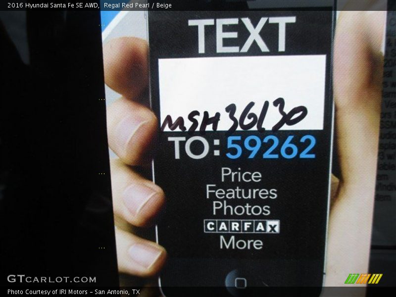 Regal Red Pearl / Beige 2016 Hyundai Santa Fe SE AWD