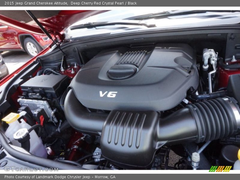 Deep Cherry Red Crystal Pearl / Black 2015 Jeep Grand Cherokee Altitude