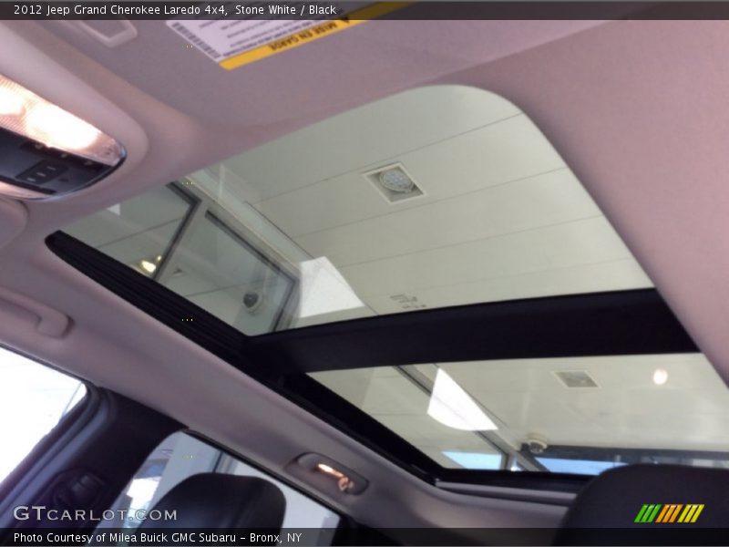 Stone White / Black 2012 Jeep Grand Cherokee Laredo 4x4