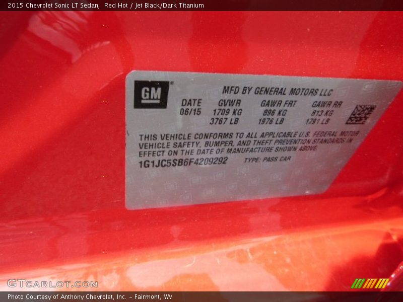 Red Hot / Jet Black/Dark Titanium 2015 Chevrolet Sonic LT Sedan