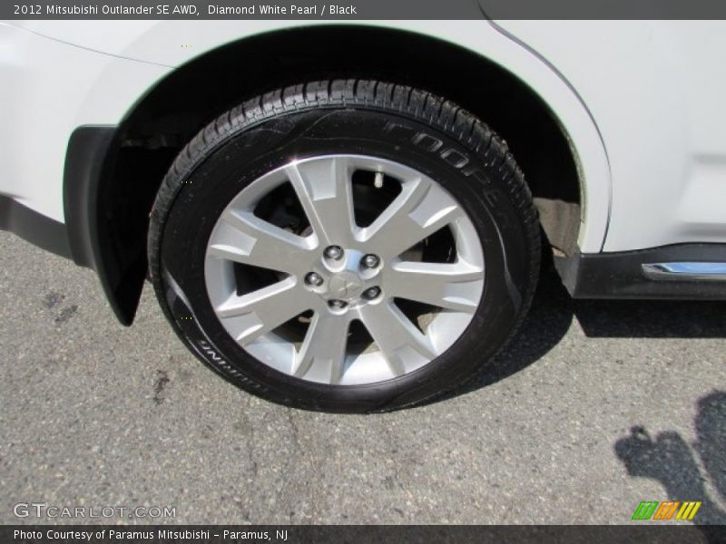 Diamond White Pearl / Black 2012 Mitsubishi Outlander SE AWD