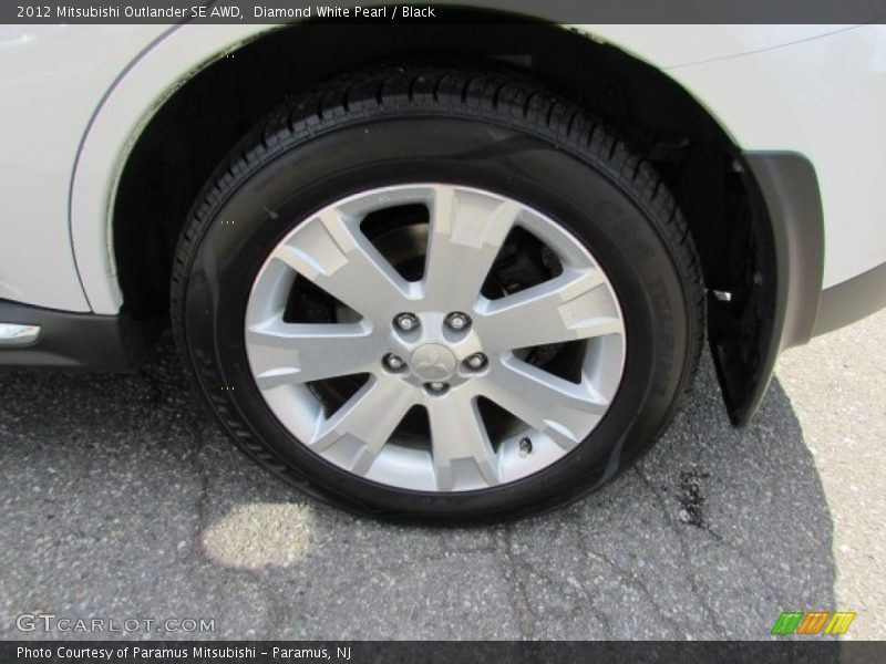 Diamond White Pearl / Black 2012 Mitsubishi Outlander SE AWD