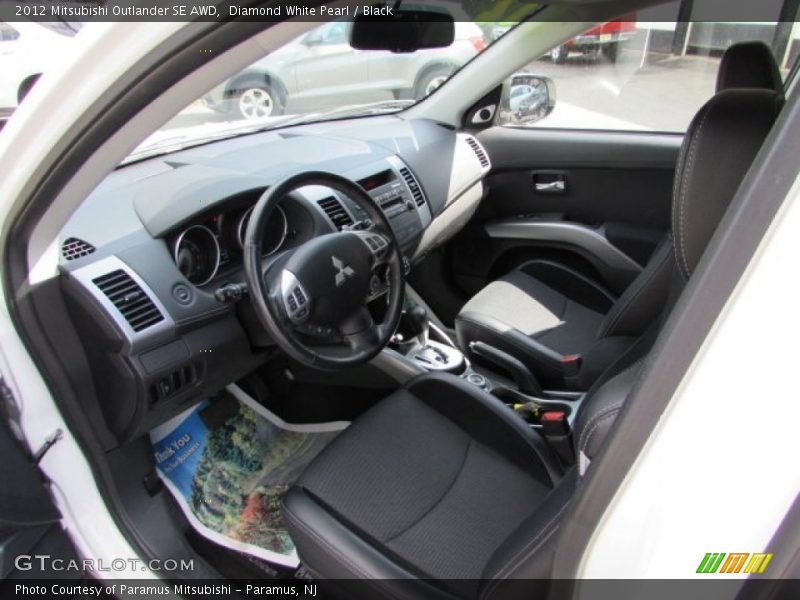Diamond White Pearl / Black 2012 Mitsubishi Outlander SE AWD